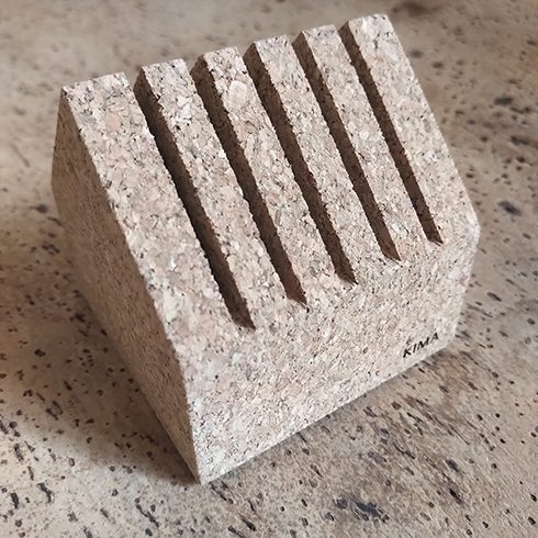 Kima Design paperweight made from cork with slots for notes or envelopes